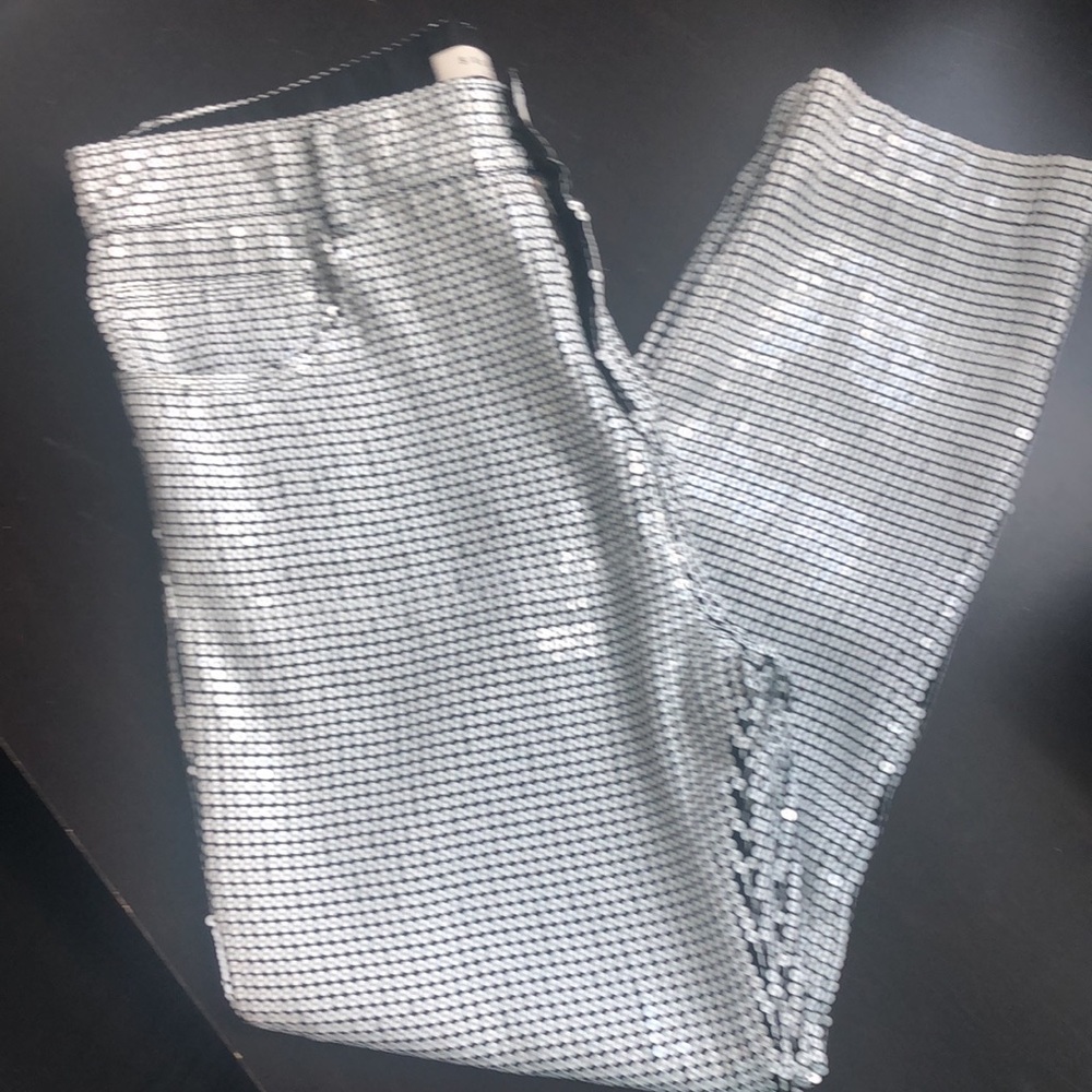 White Sequins Pants on black lining.